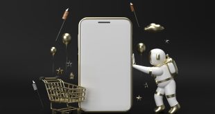 A 3D-rendered image features a large smartphone mockup in the center, symbolizing e-commerce or online shopping. A gold shopping cart and a gold astronaut figure are positioned beside the phone, with gold balloons, stars, rockets, and clouds floating around, all set against a black background. The scene conveys a festive and futuristic online shopping theme.